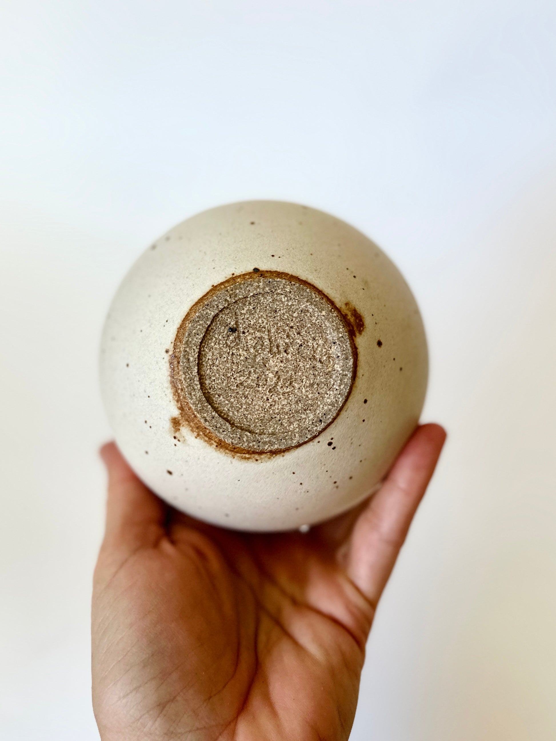 Warm satin white speckled orb no. 17