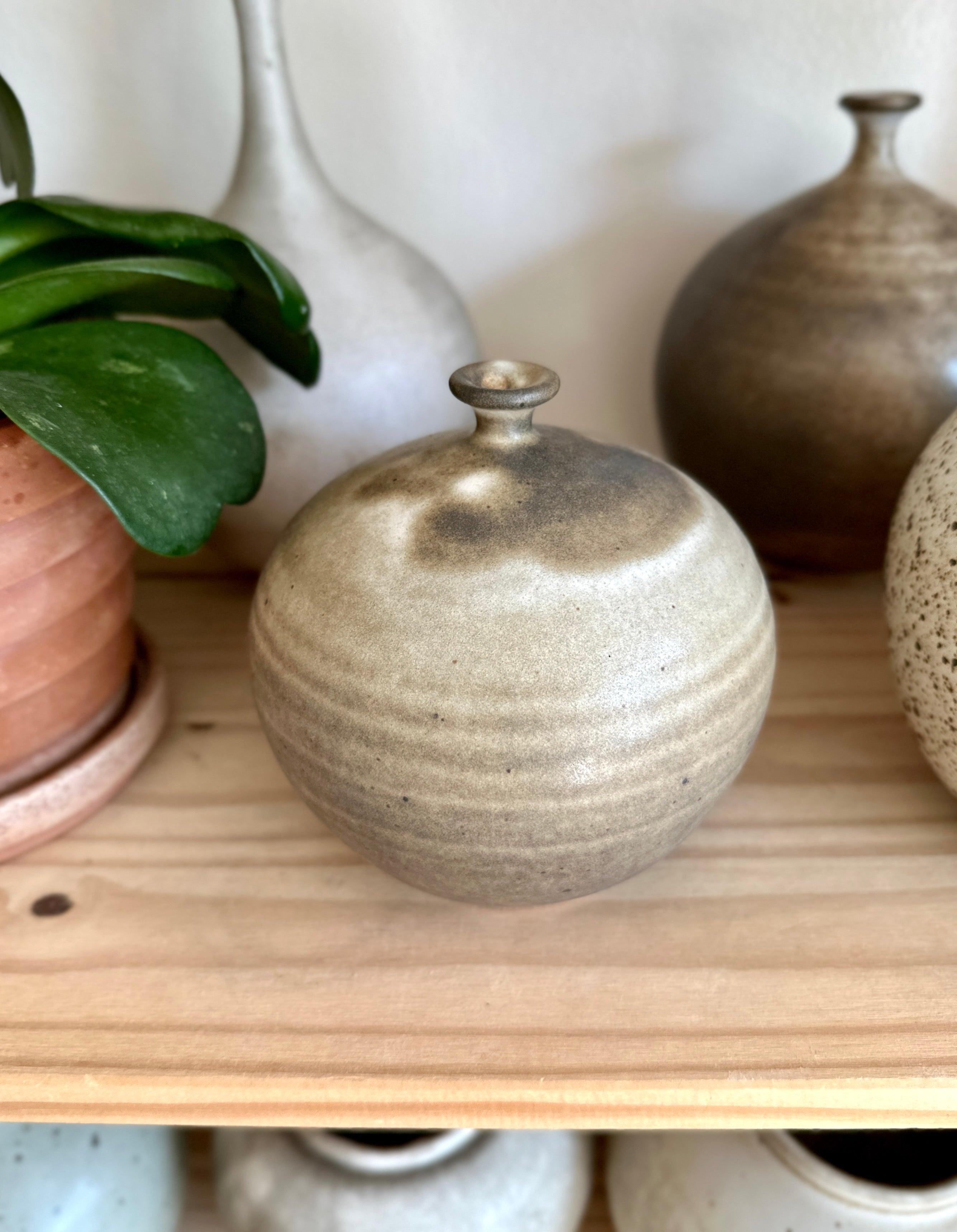 Gray/brown little neck vessel no. 34