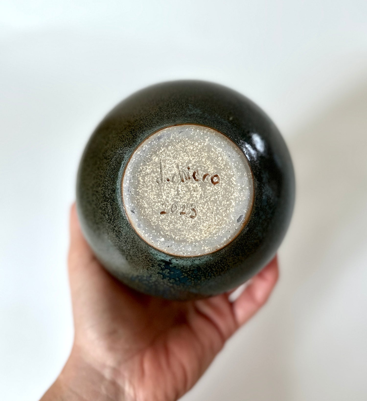 Bronze and celadon bubble vessel