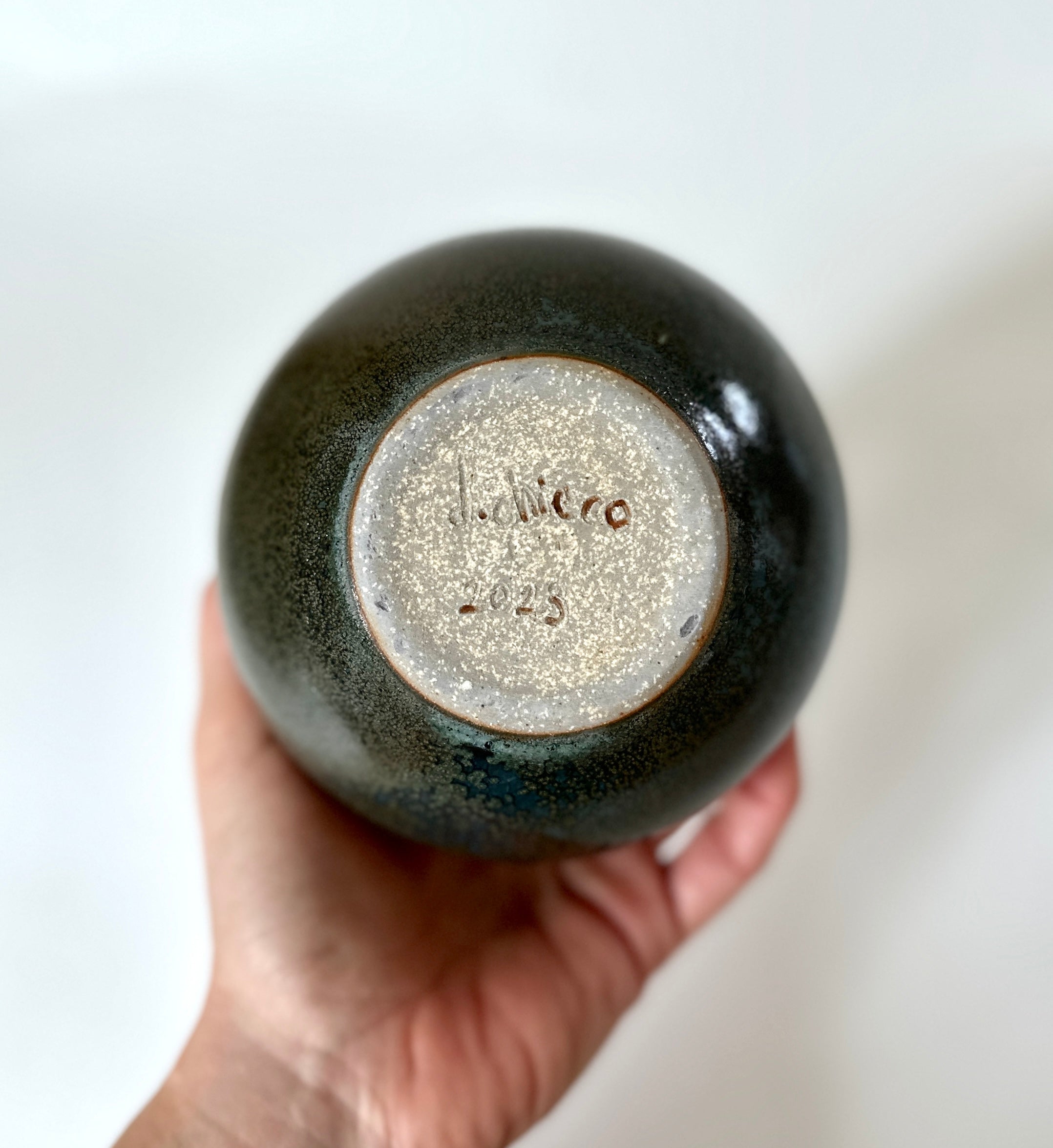 Bronze and celadon bubble vessel