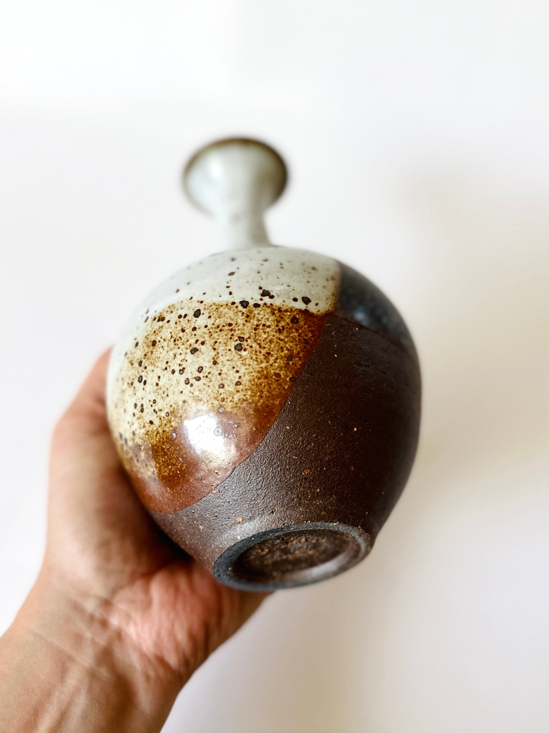 Red clay with poured glossy white no. 6