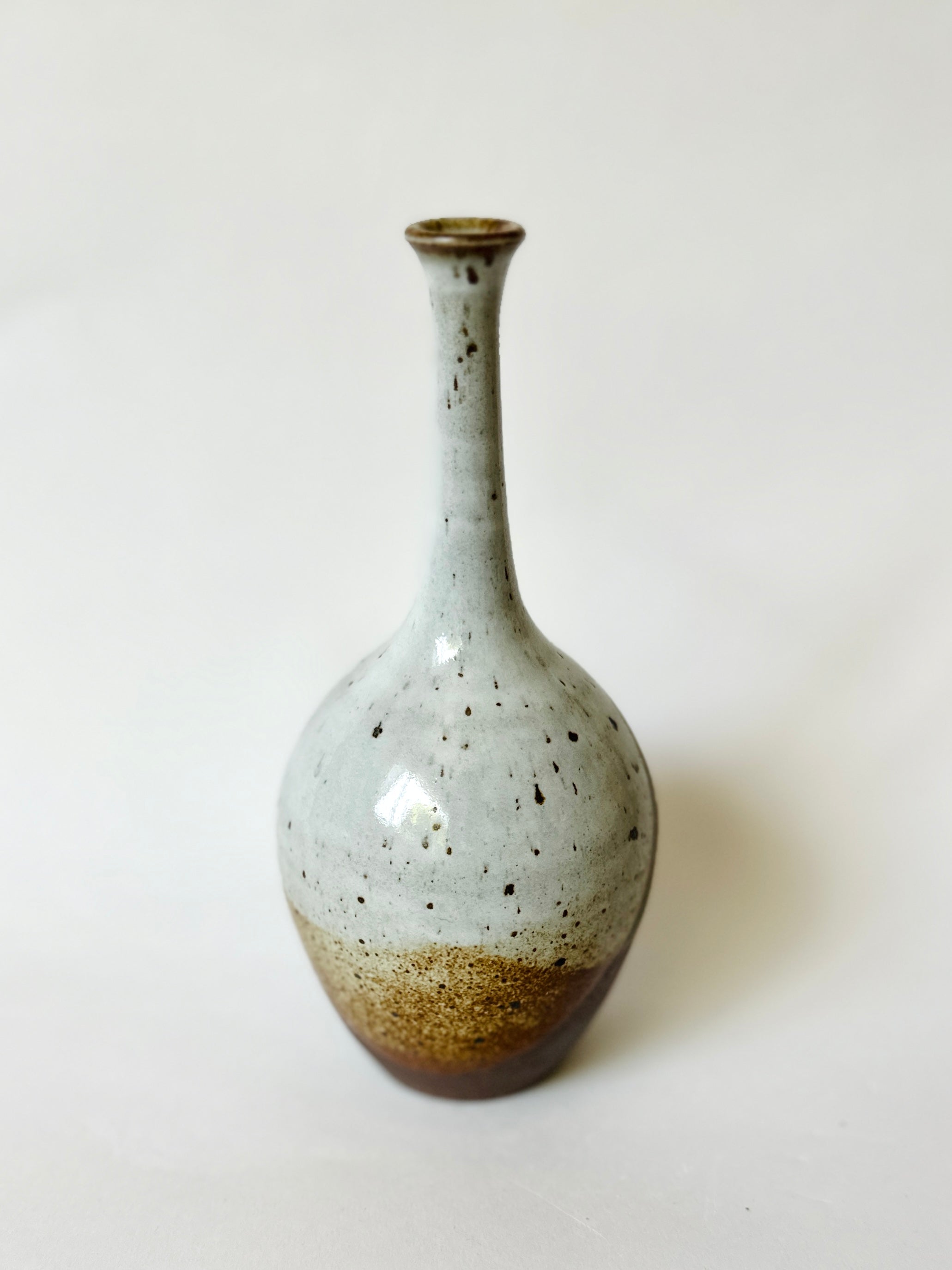 Red clay with poured glossy white no. 5