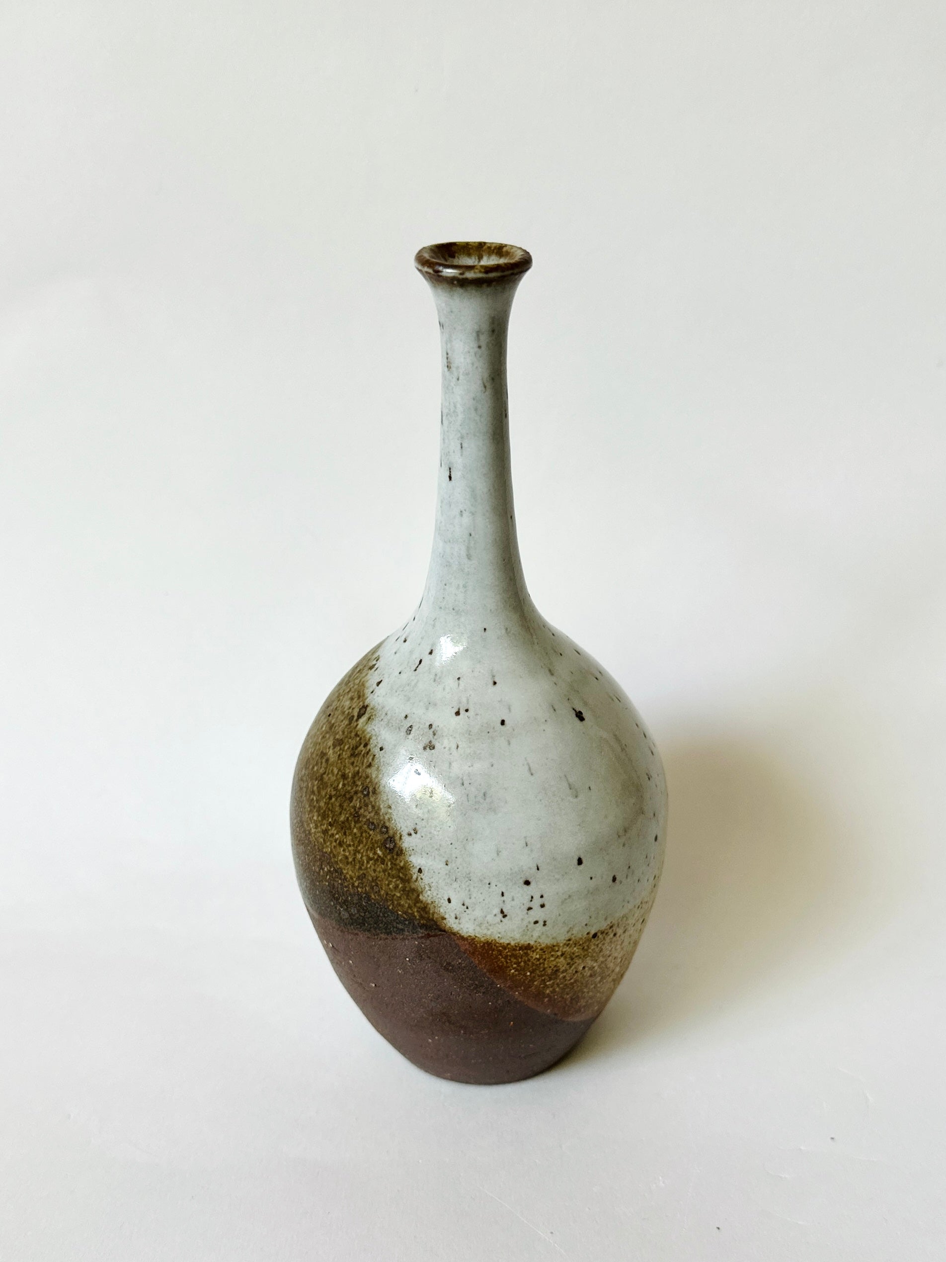 Red clay with poured glossy white no. 5