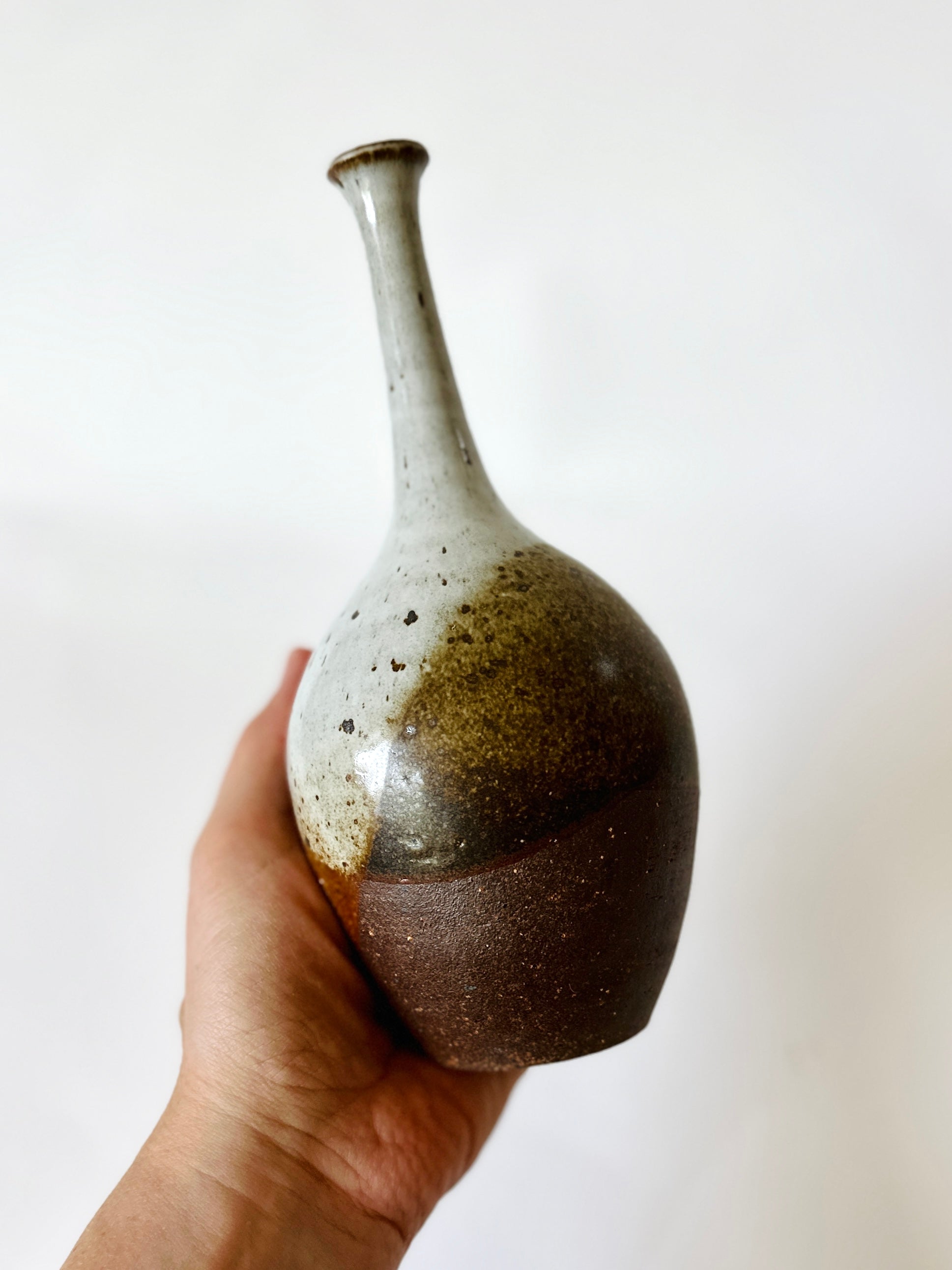 Red clay with poured glossy white no. 5