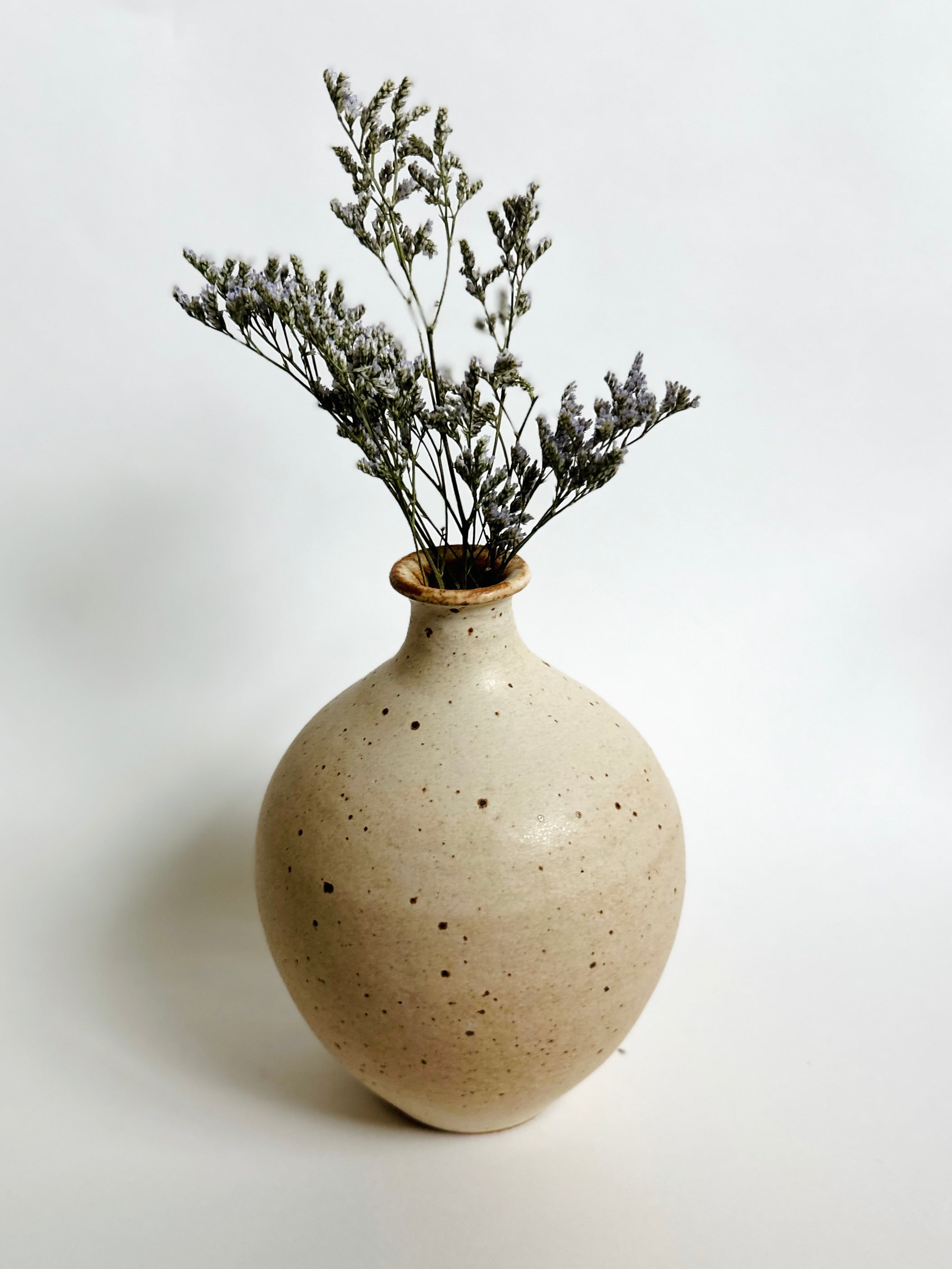 Warm satin white speckled vase no. 10