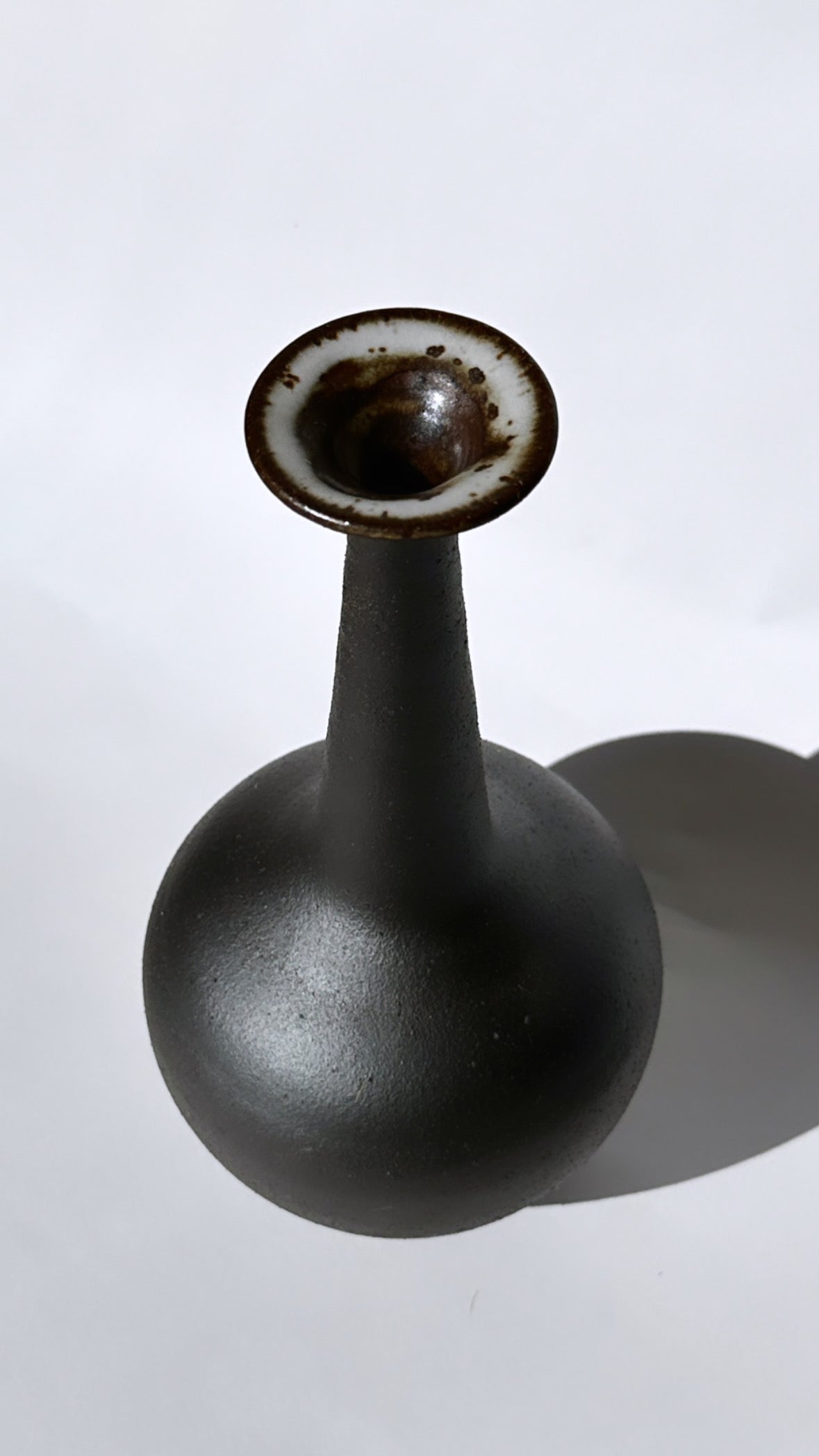 Black clay tall flared bottleneck no. 12