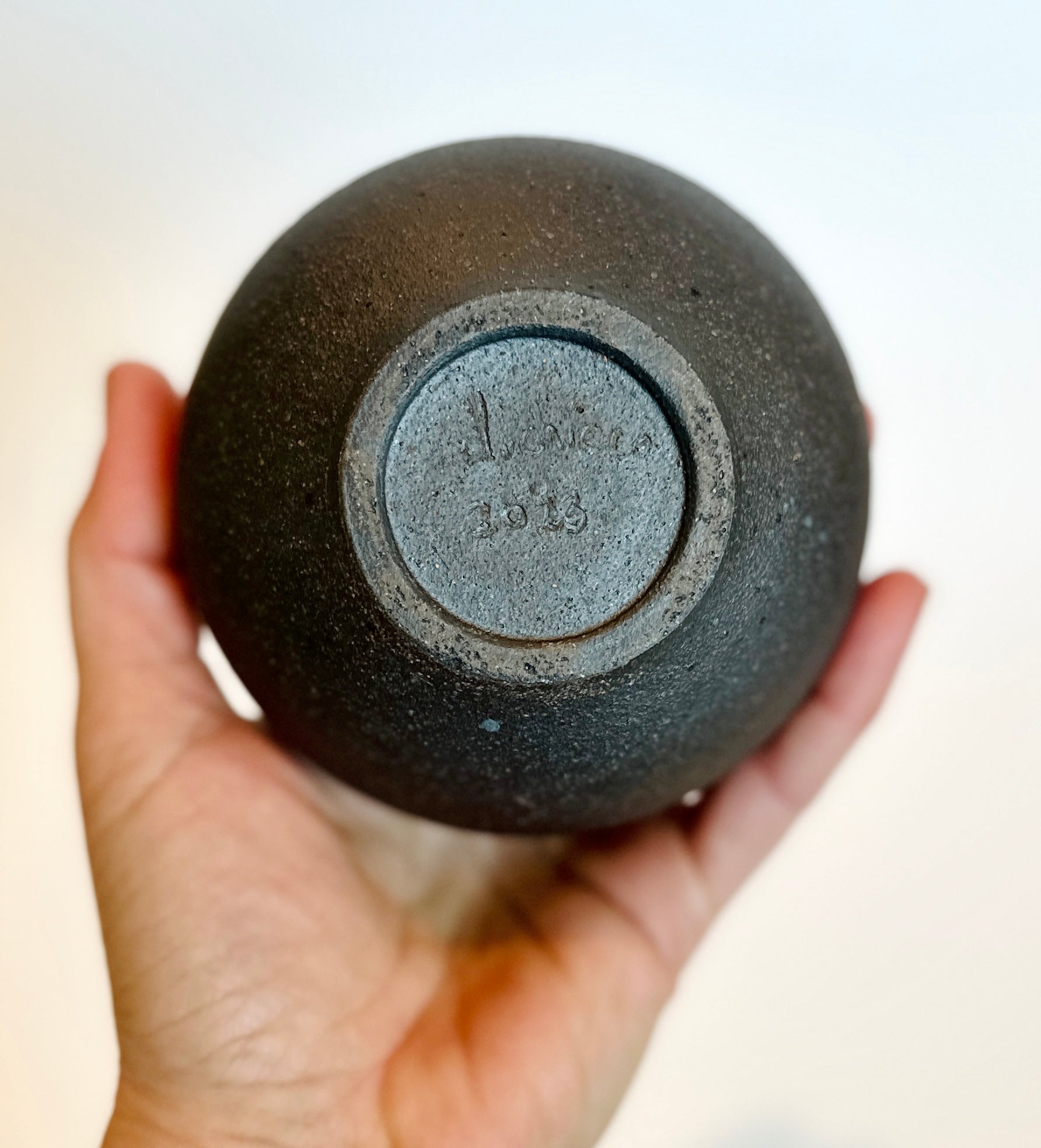 Black clay poured glaze orb
