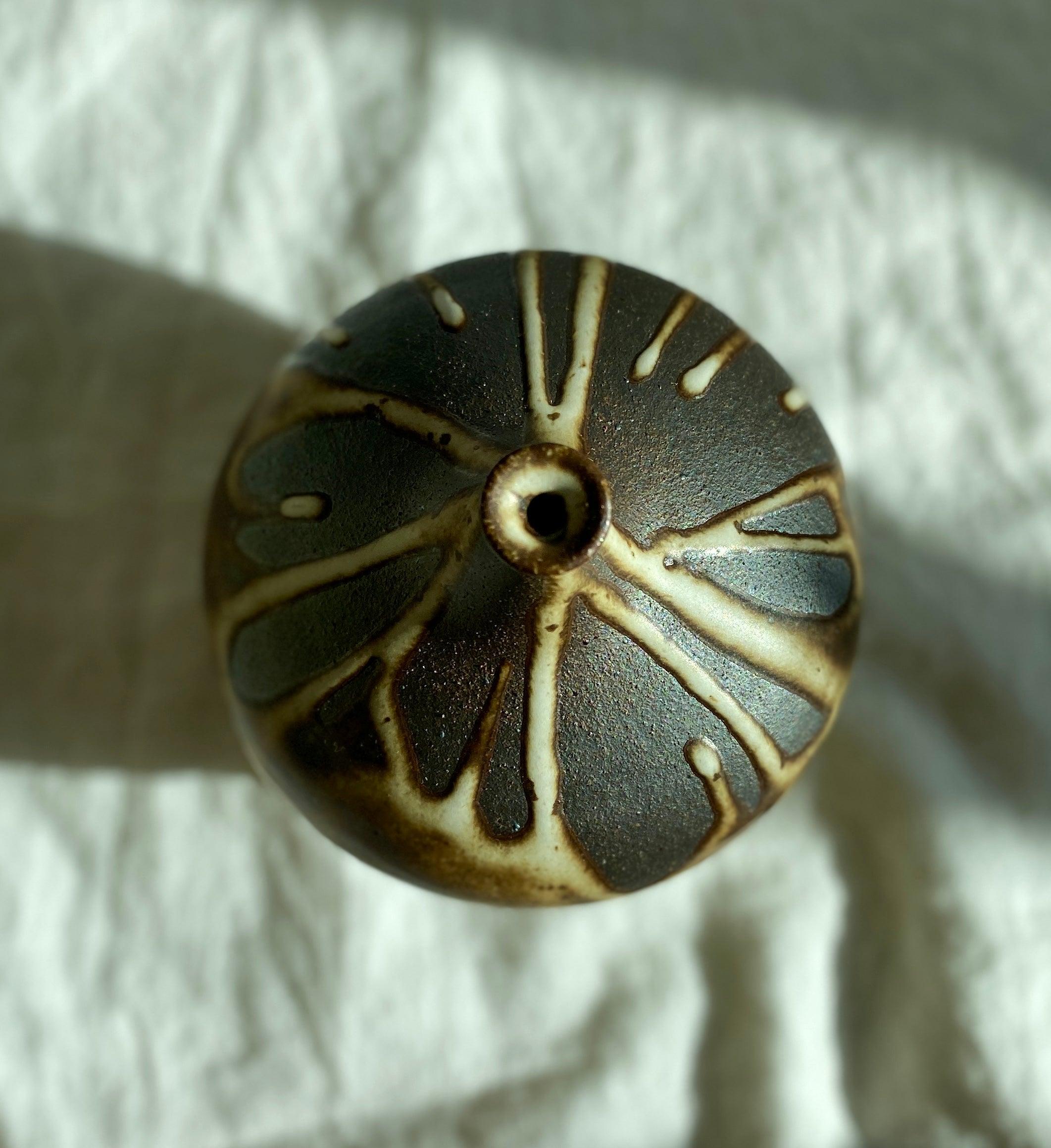 Poured glaze on black clay no. 3 - Dana Chieco Studio