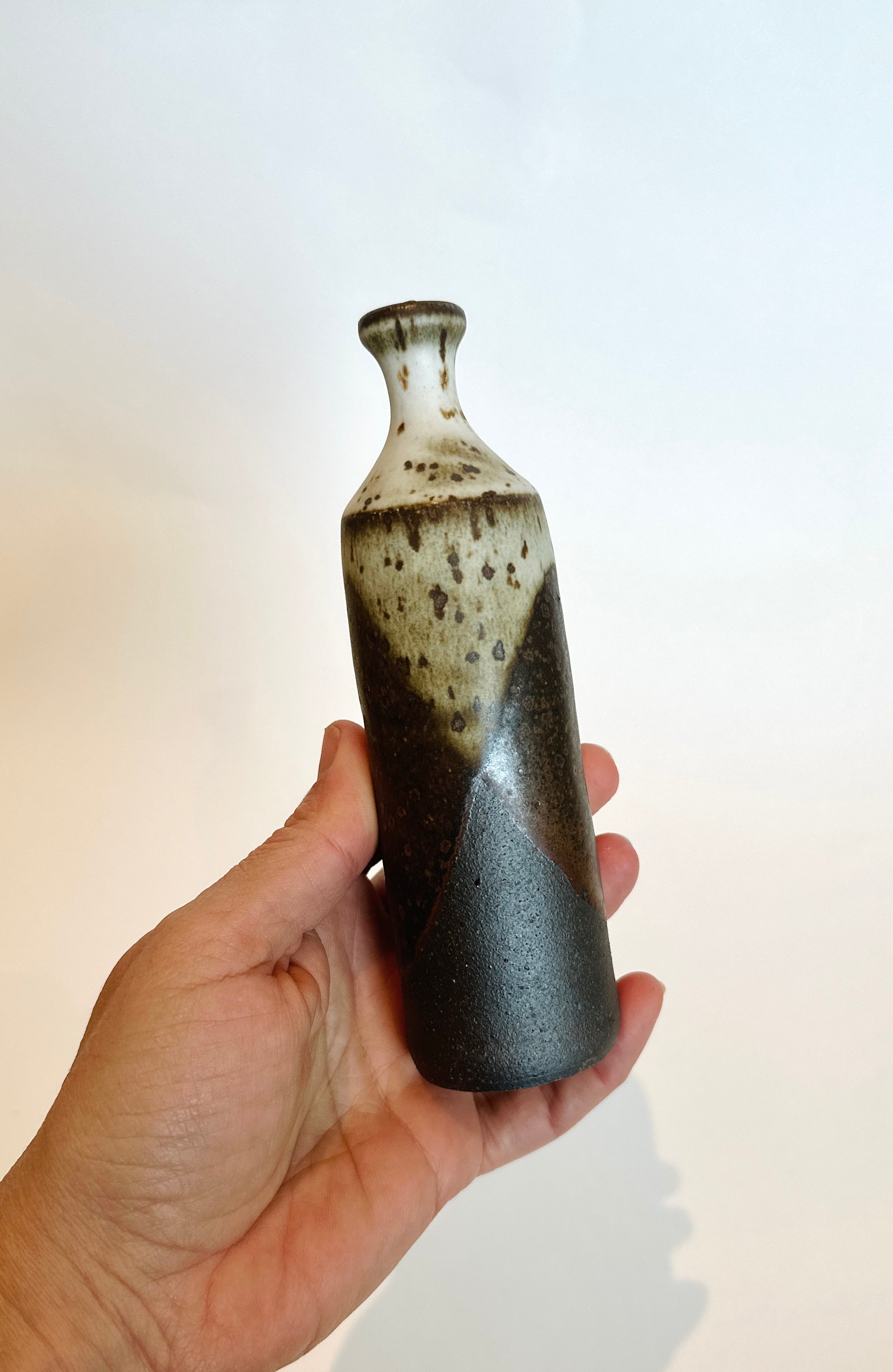 Black clay poured glaze slim vase