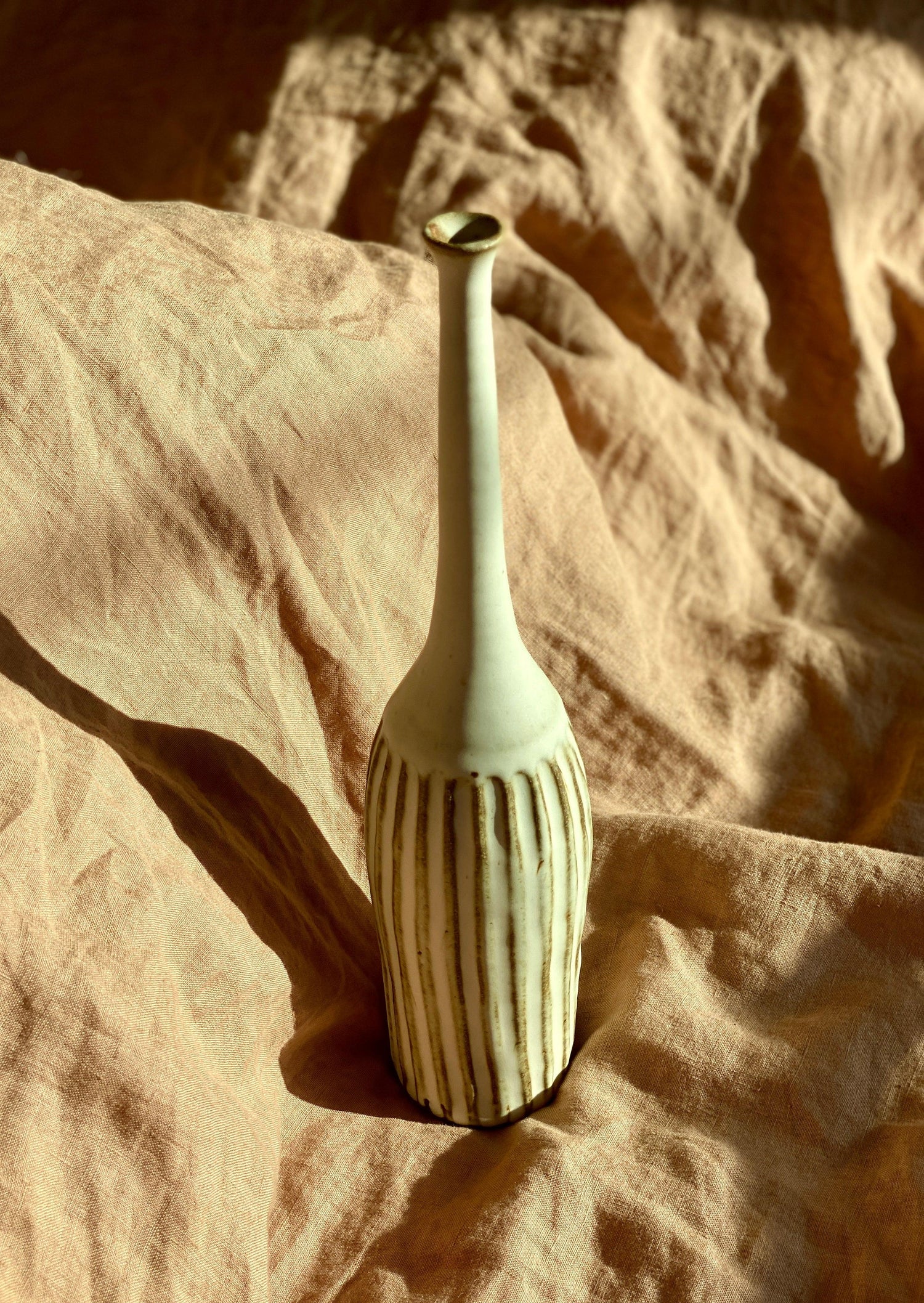 Matte white carved tall bottle with red clay No. 3 - Dana Chieco Studio