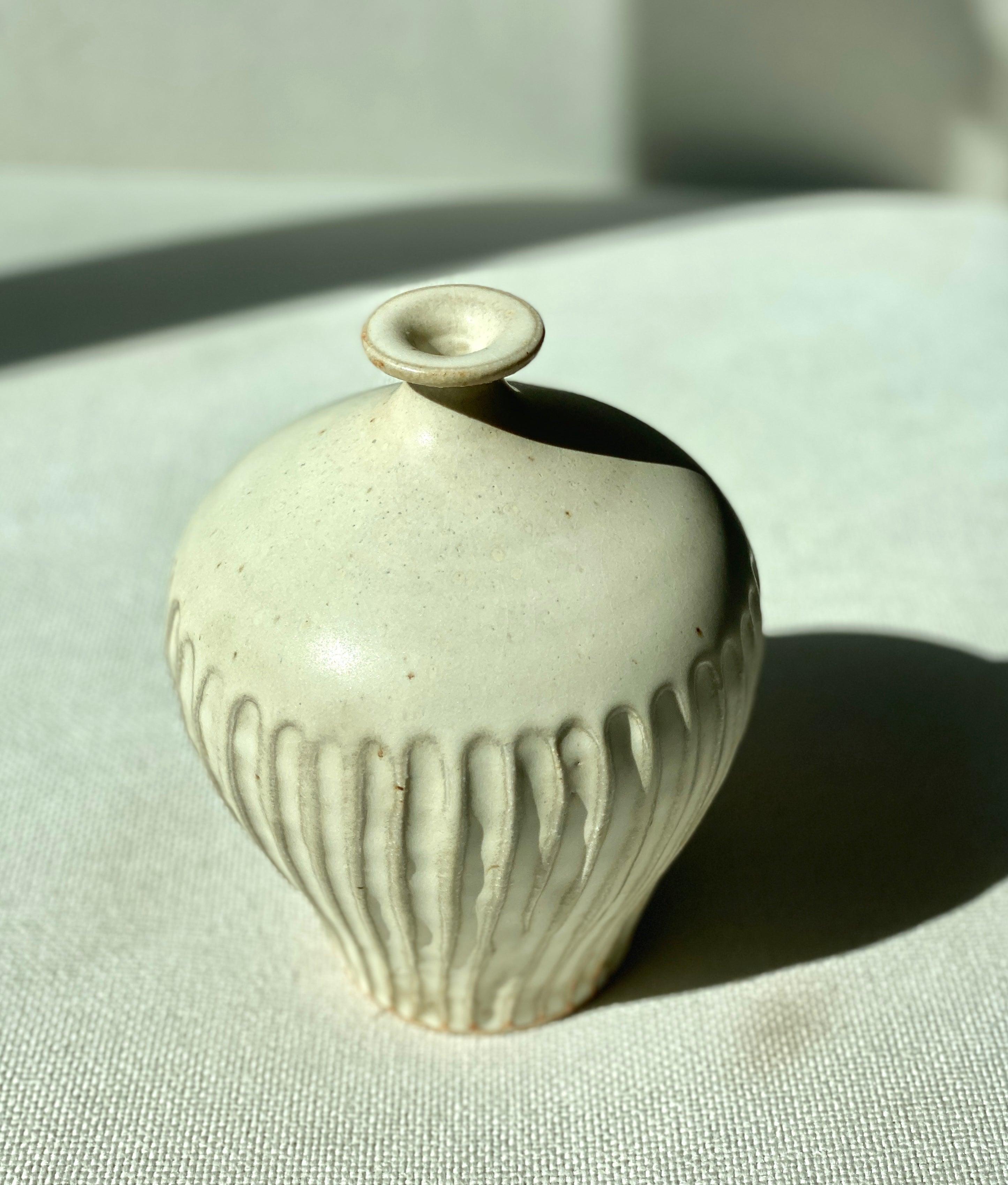 Matte white carved decorative vase No. 1 - Dana Chieco Studio