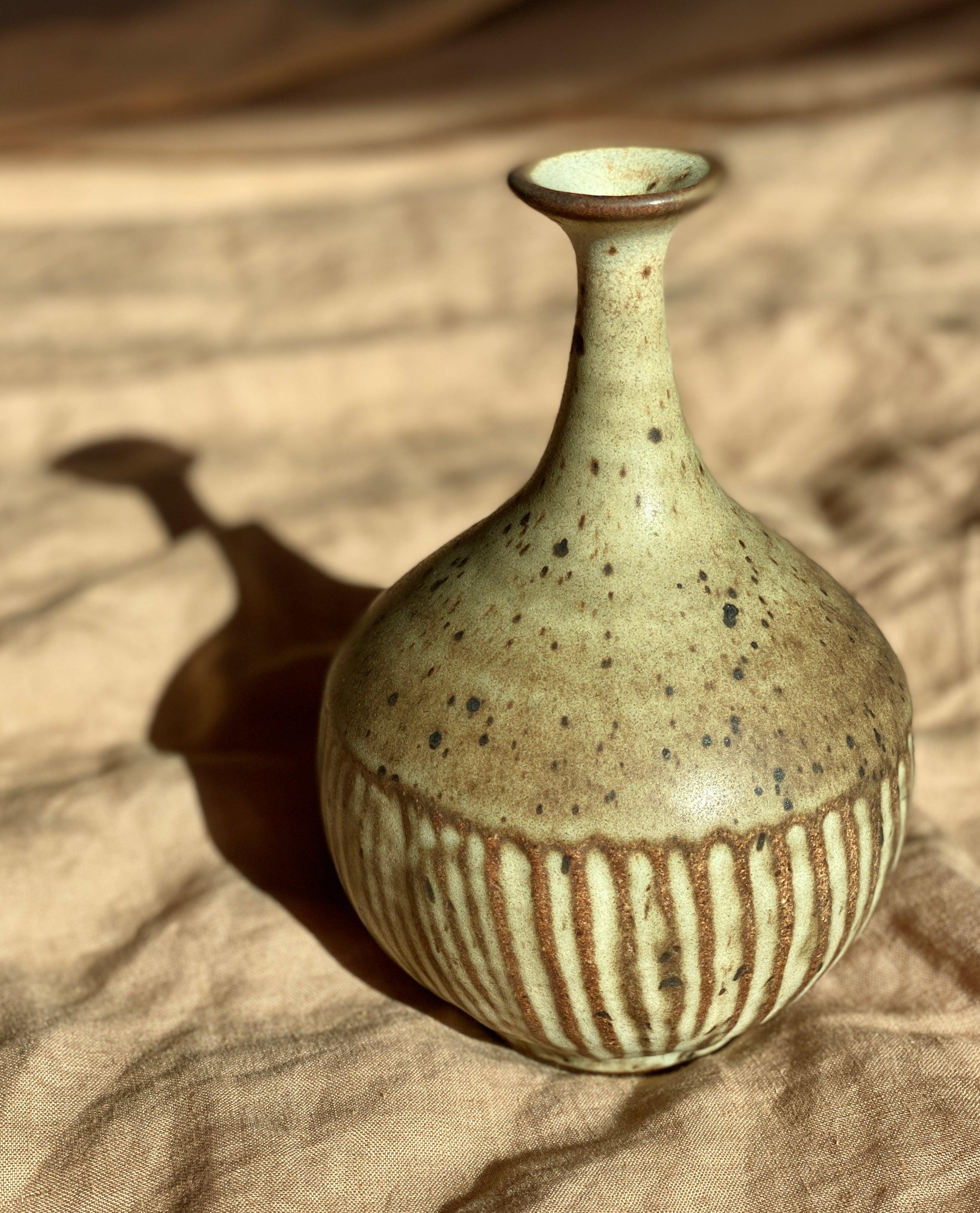 Matte white carved decorative bottle No. 1 - Dana Chieco Studio