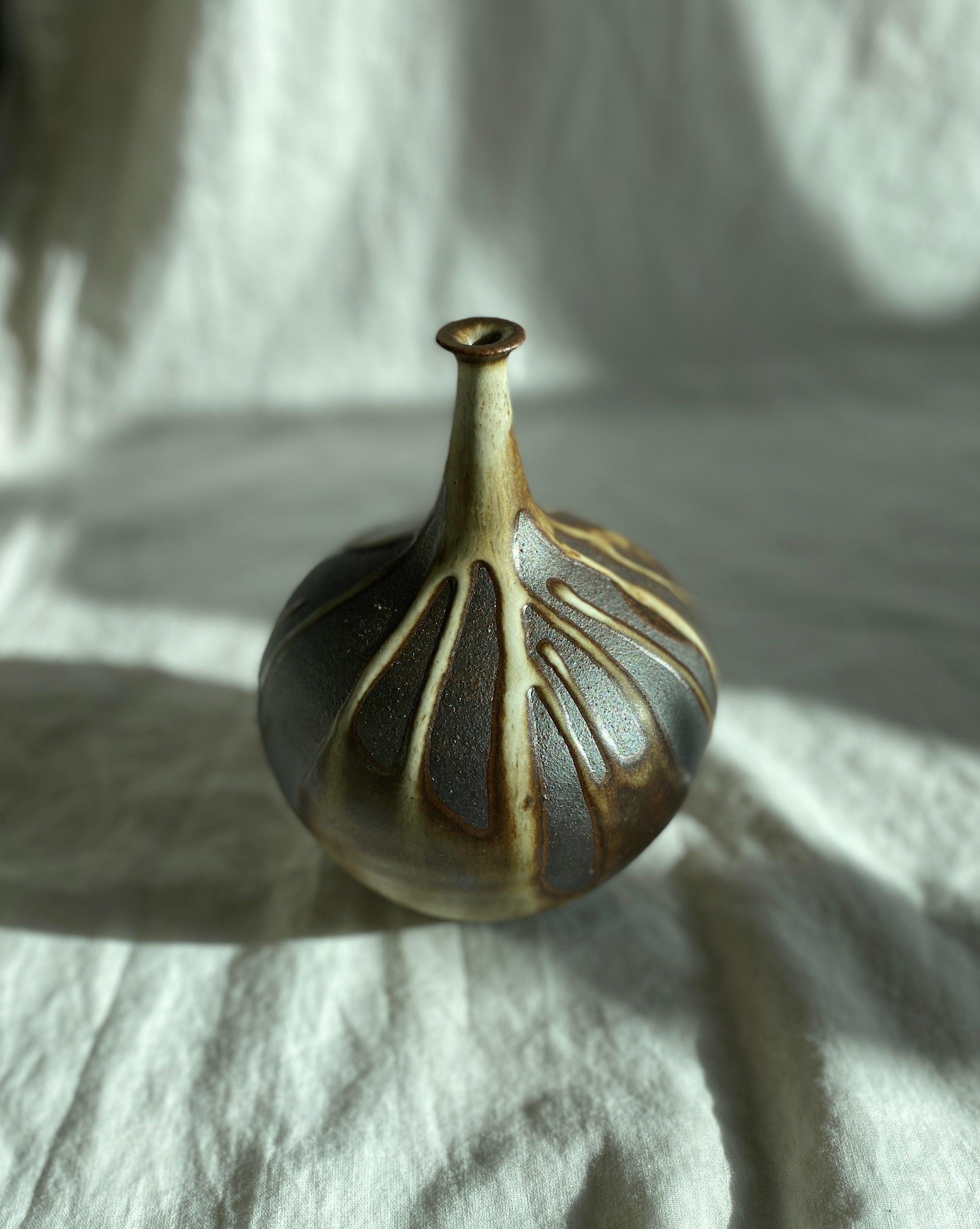 Poured glaze on black clay no. 1 - Dana Chieco Studio