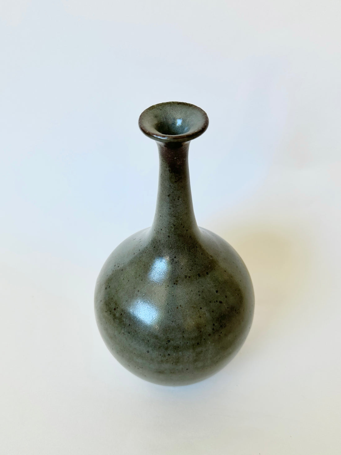 Black clay bottleneck with celadon no. 3