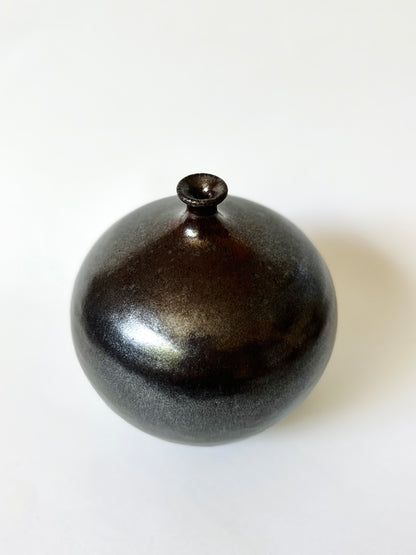 Metallic glazed black clay