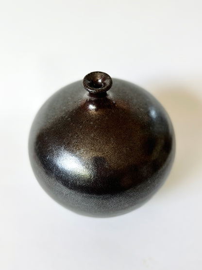 Metallic glazed black clay