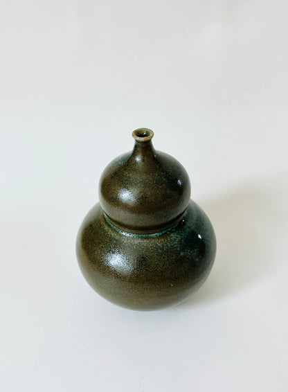 Bronze and celadon bubble vessel