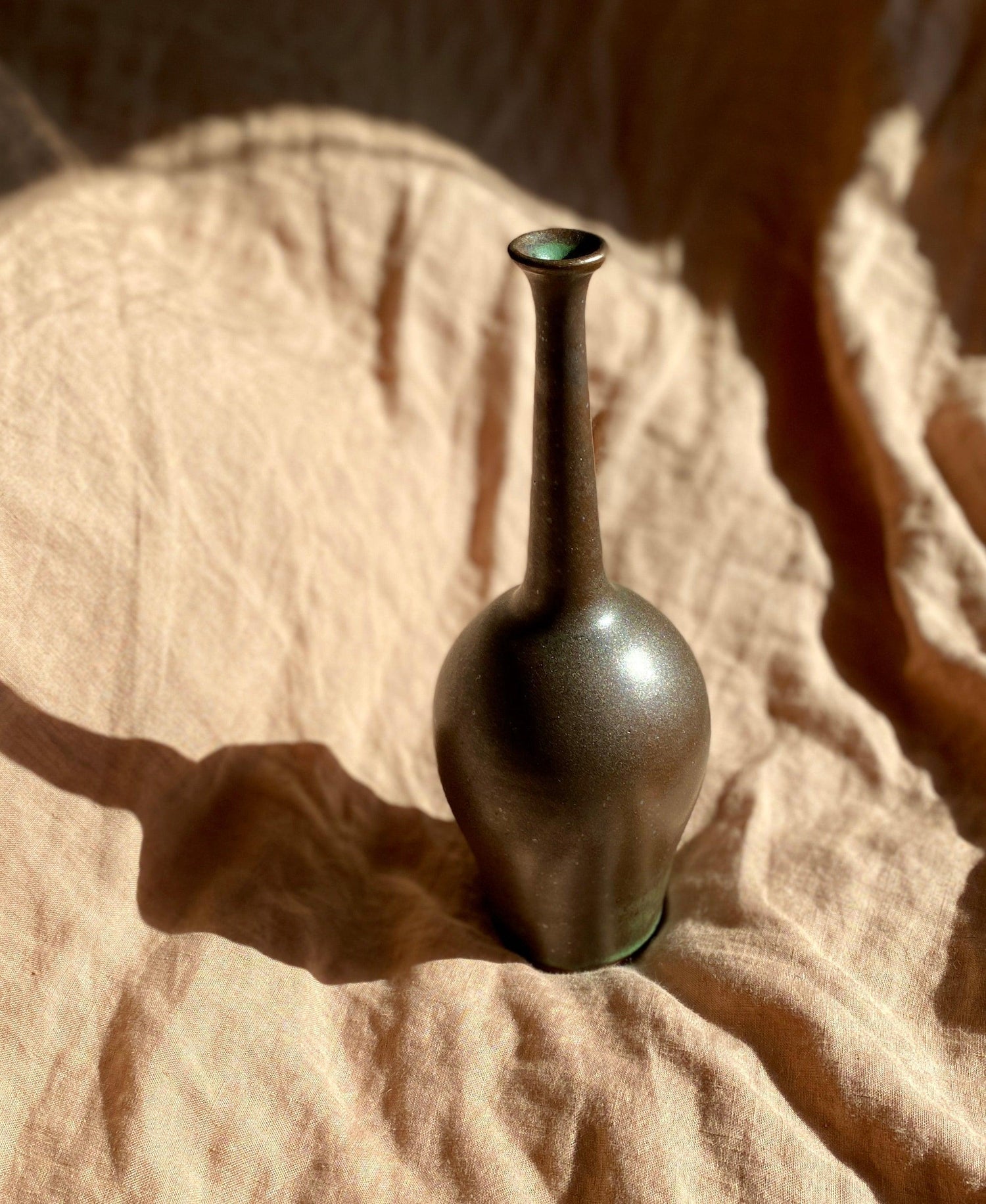 Bronze decorative bottle with green highlights - Dana Chieco Studio