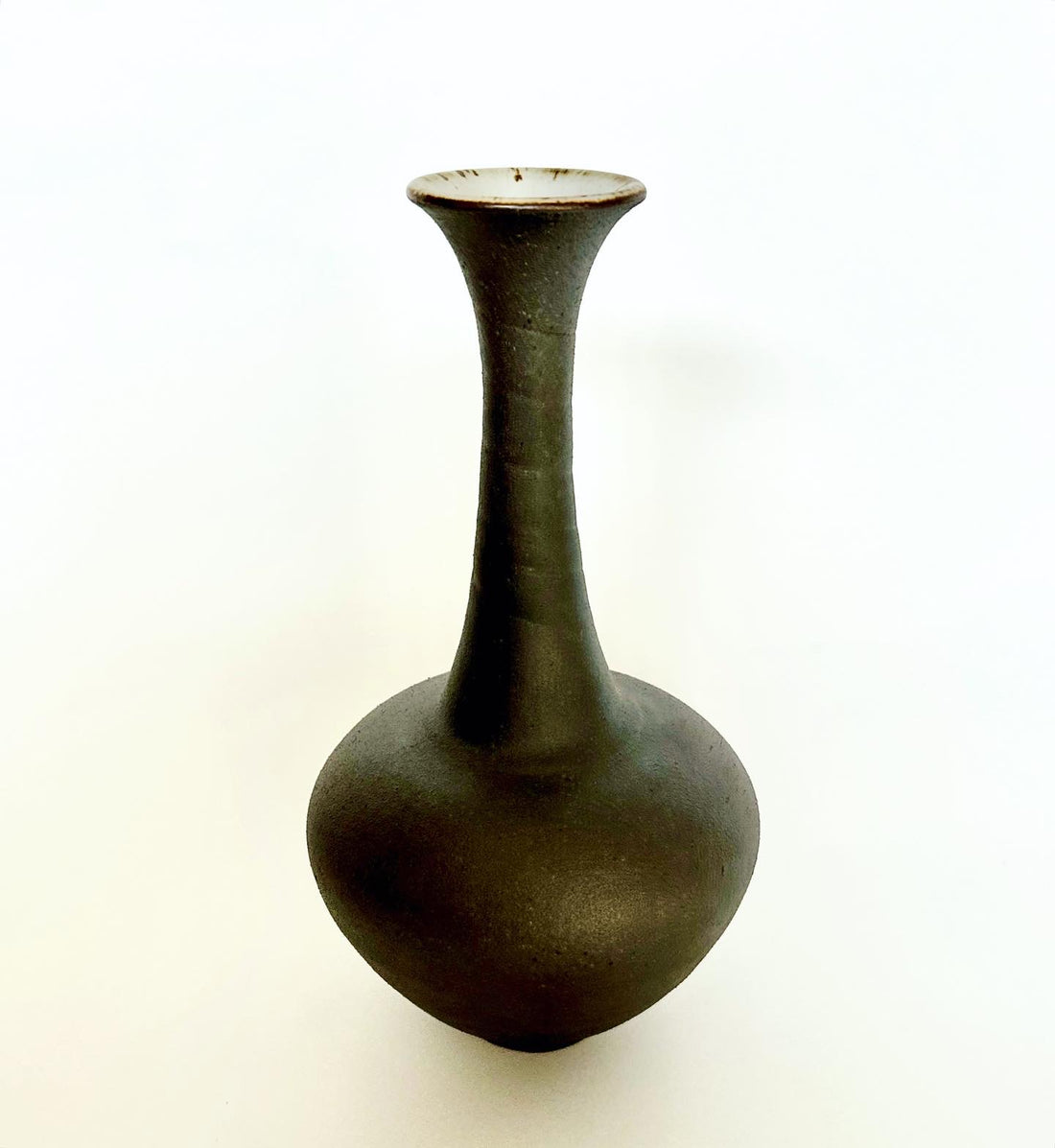 Black clay flared bottleneck no. 11