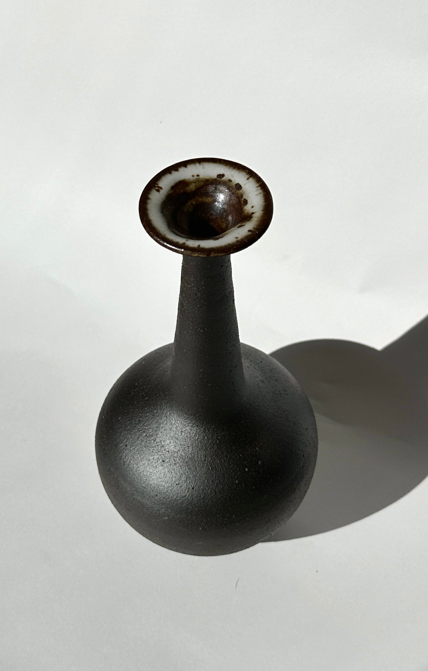 Black clay tall flared bottleneck no. 12
