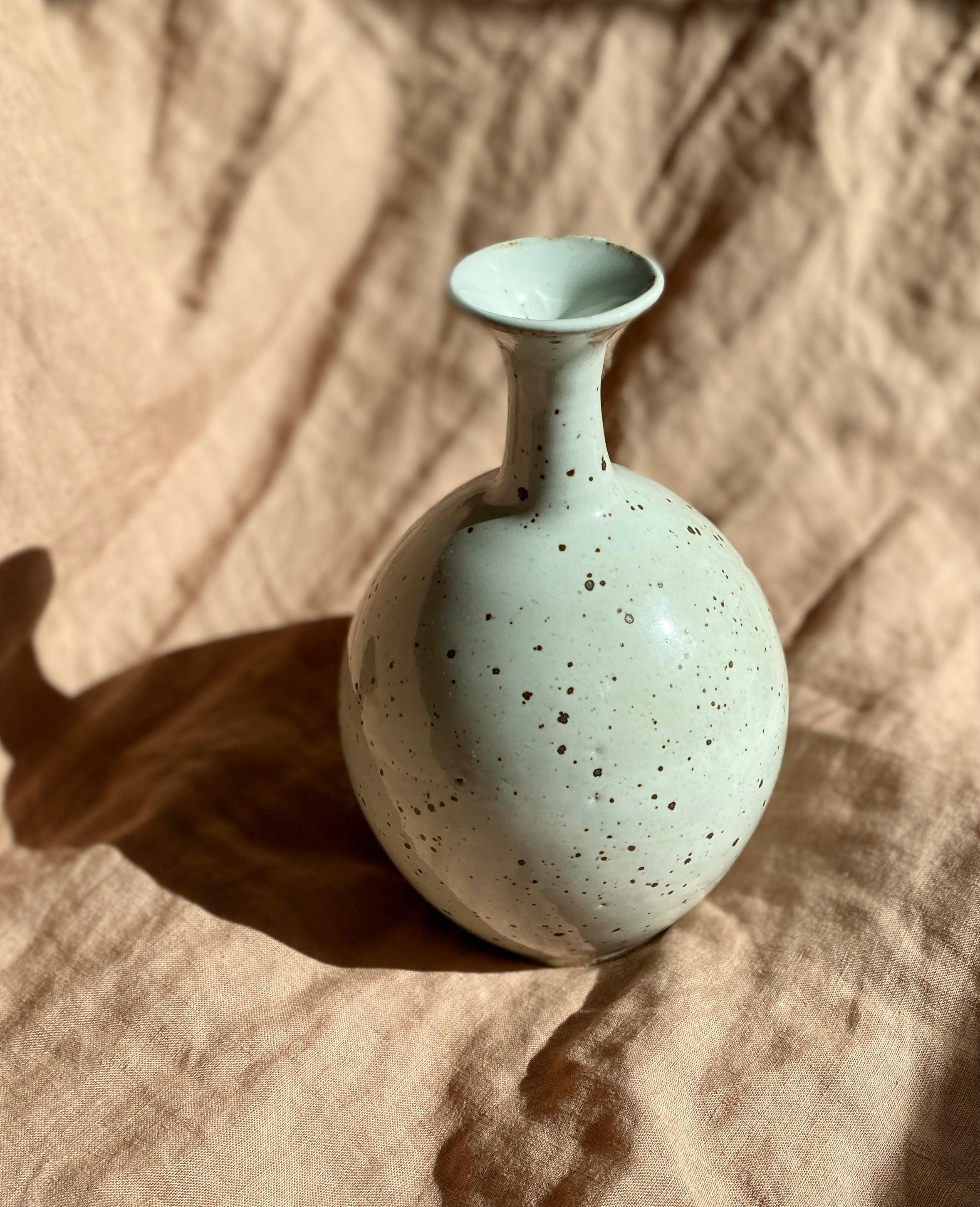 Glossy white speckled bottle-neck vase - Dana Chieco Studio