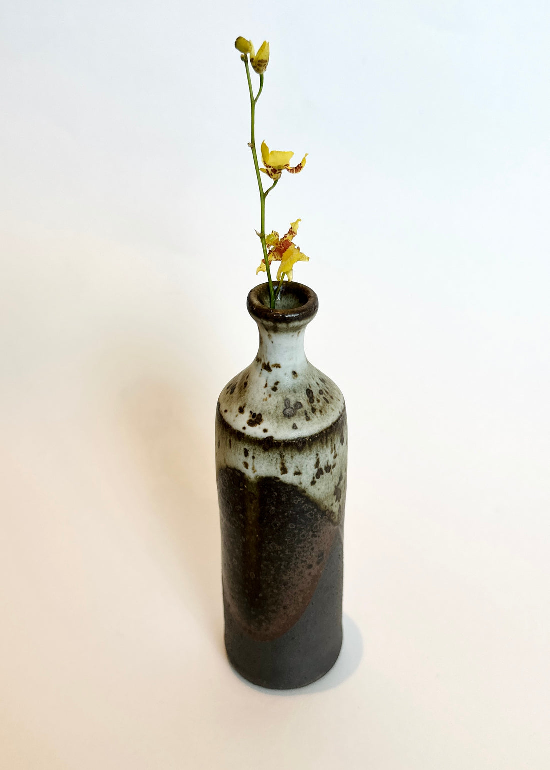 Black clay poured glaze slim vase