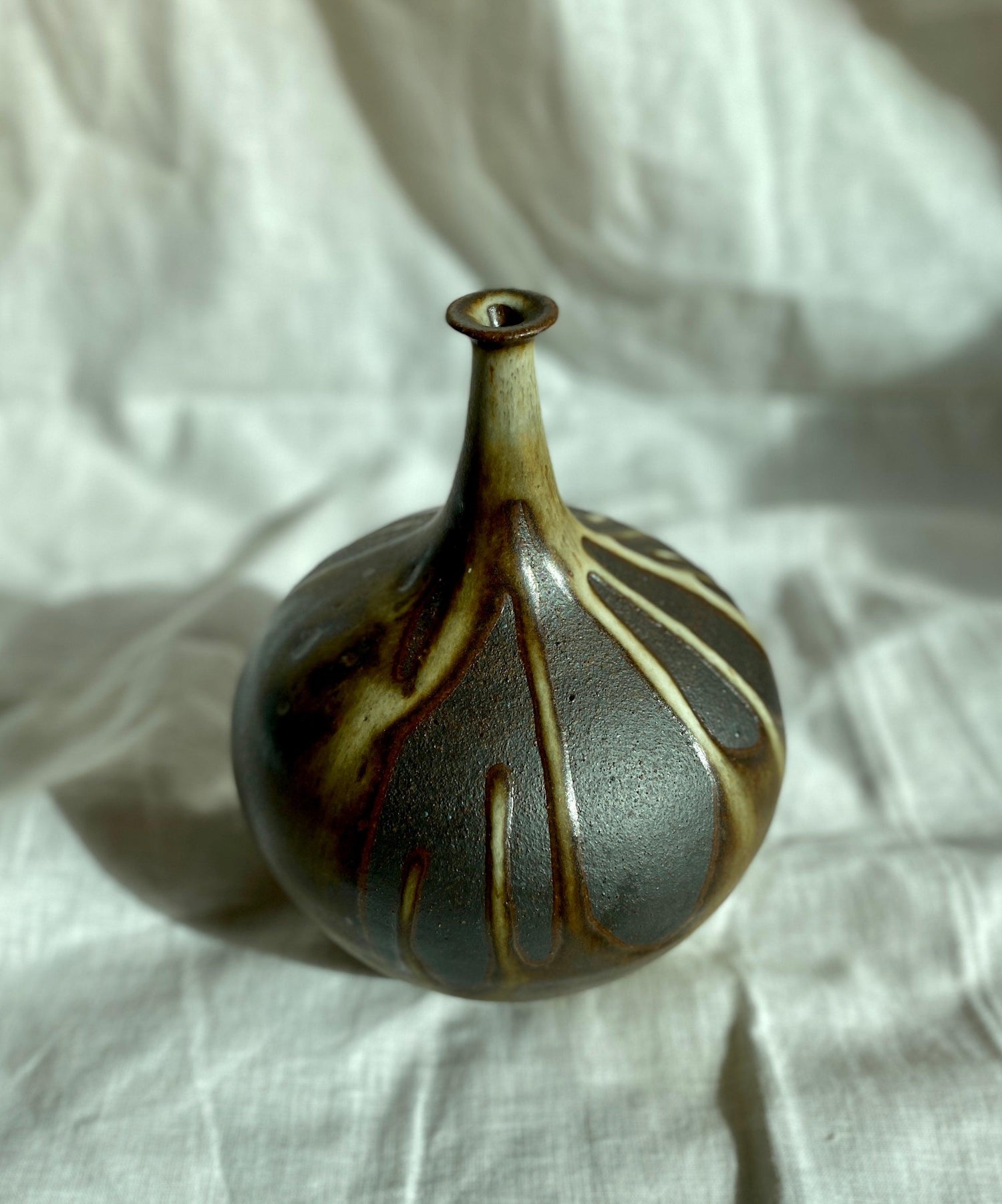 Poured glaze on black clay no. 1 - Dana Chieco Studio