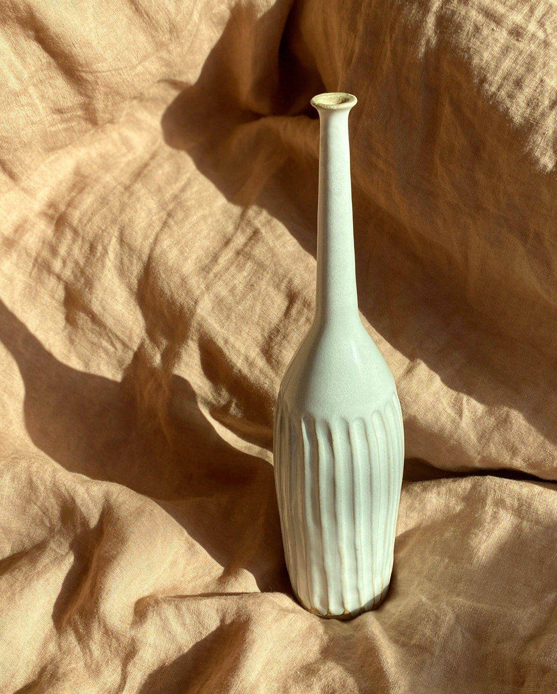 Glossy white carved tall bottle No. 9 - Dana Chieco Studio
