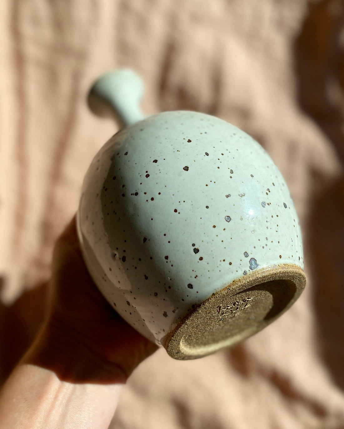 Glossy white speckled bottle-neck vase - Dana Chieco Studio